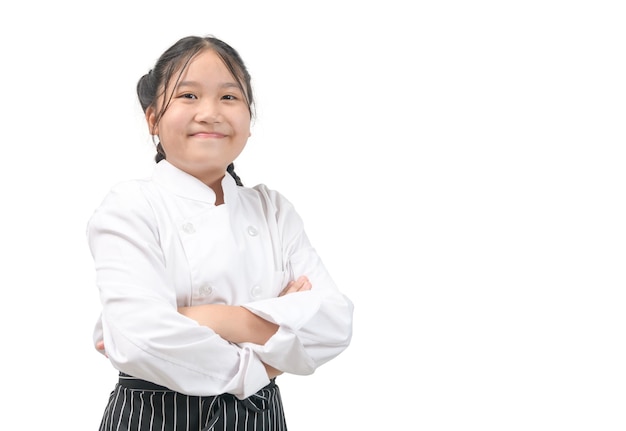 Schattig Aziatisch meisje in uniform van de chef-kok geïsoleerd op een witte achtergrond, beroep en service concept