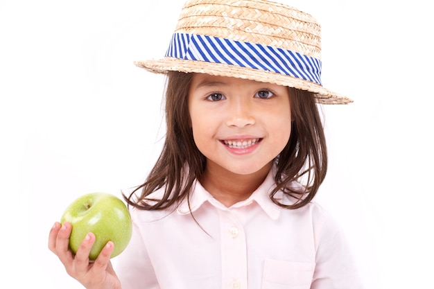 Schattig klein meisje, hand met groene appel