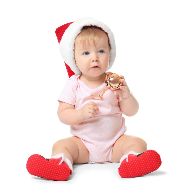 Schattige baby in Kerstman hoed op witte achtergrond