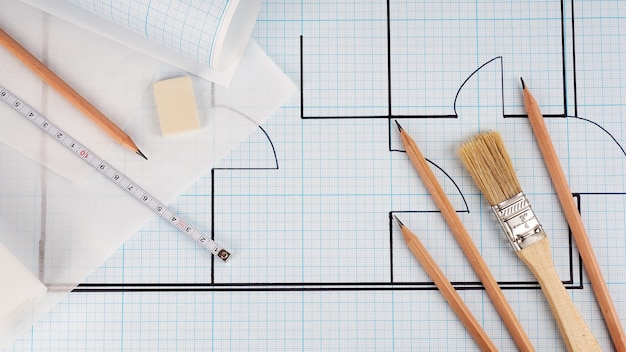 Schematic plan of the apartment, drawing on millimeter paper in a roll. Builder concept of repair and design.