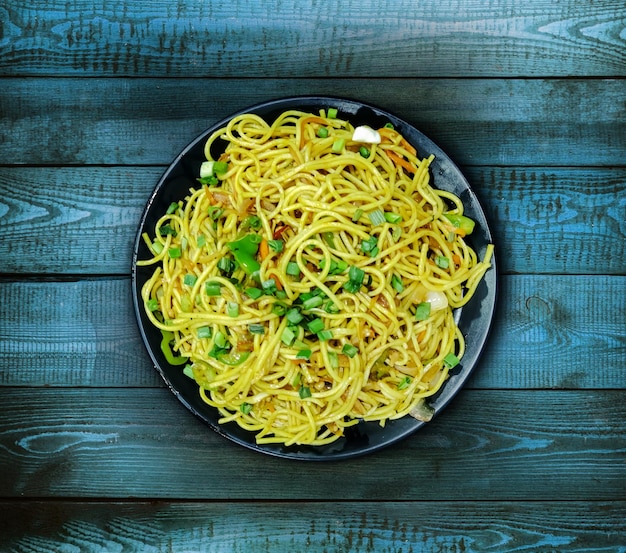 Schezwan Noodles or vegetable Hakka Noodles or chow mein