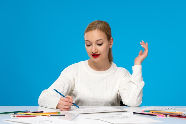 Schilder mooi jong mooi meisje met rode lippenstift iets op tafel tekenen