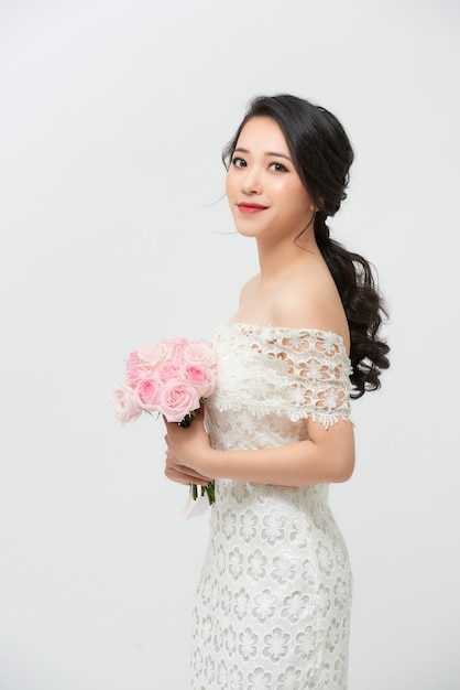 Schitterende, Aziatische bruid in witte luxekleding