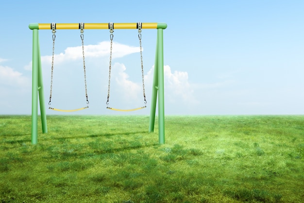 Schommel hangend aan een ijzeren pilaar op de speelplaats met uitzicht op de blauwe lucht