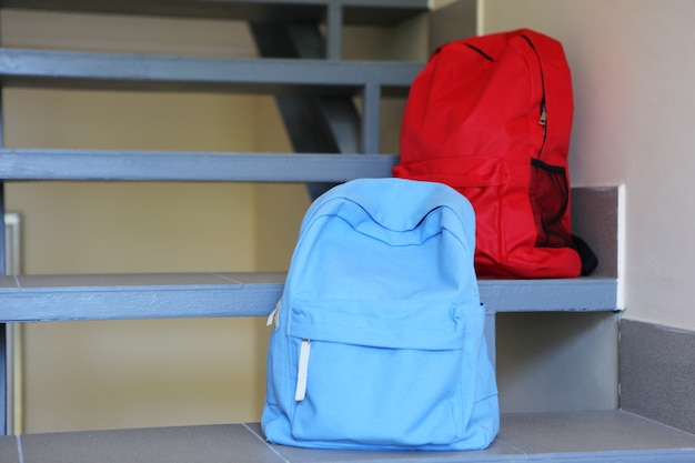 Photo school backpack and stationery in a bright room