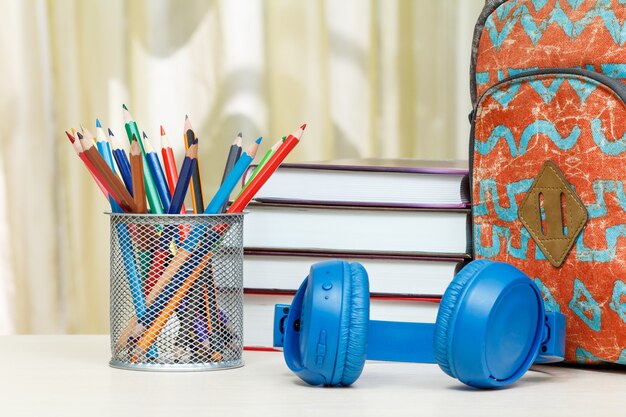 School backpack with school supplies