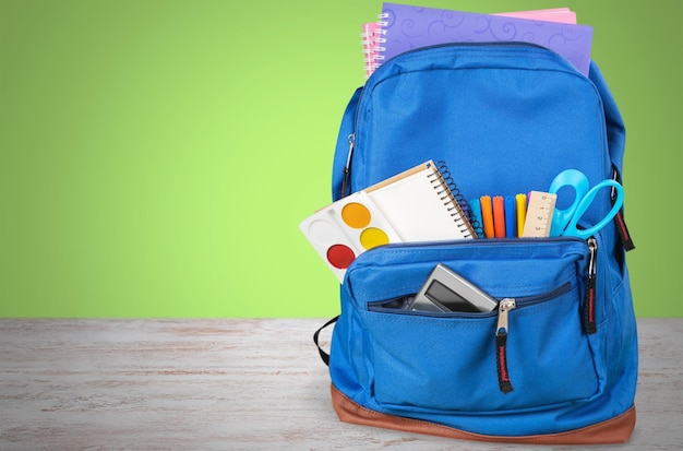 School Backpack with stationery, close-up view