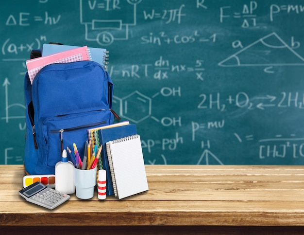 School Backpack with stationery, close-up view