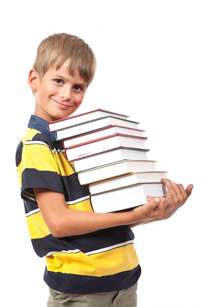 School boy is holding books isolated