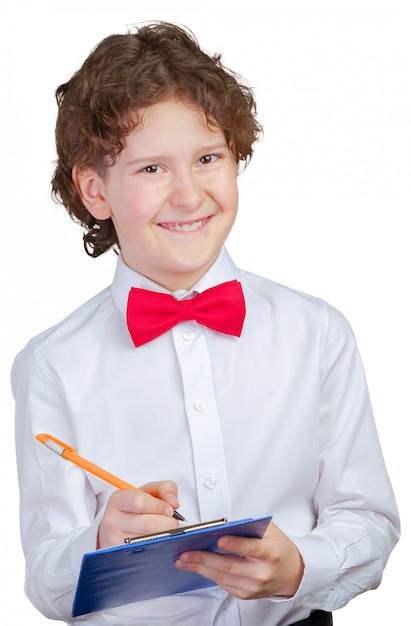 School boy in suit and blank paper sheet in clipboard