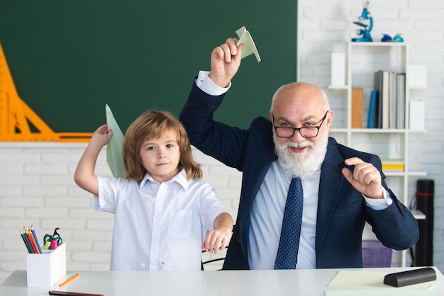 School break teacher with pupil with airplanes education teachering learning