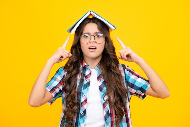 School child with book Learning and education Unhappy upset teenager schoolgirl