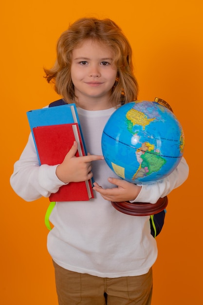 School children school kid hold world globe and book back to school funny little student boy from el