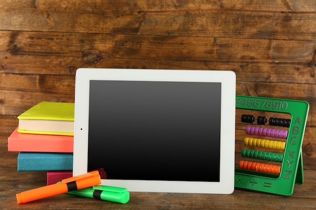 School equipment on wooden background