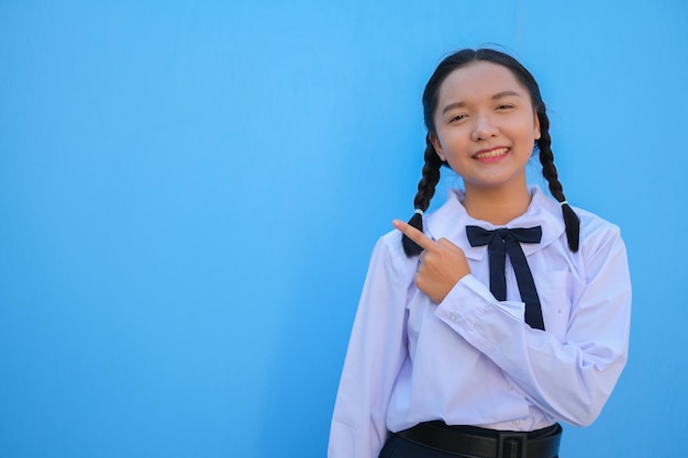 School girl on blue background