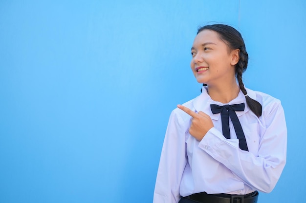 School girl on blue background