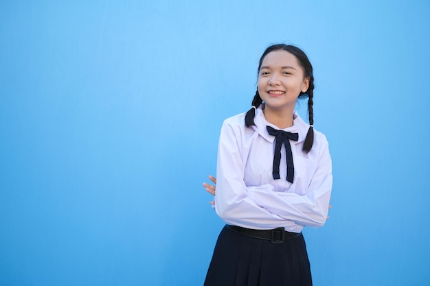 School girl on blue background