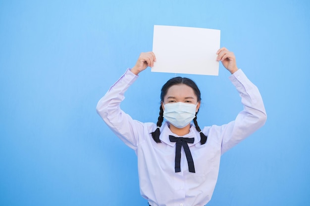 School girl show billboard on blue background