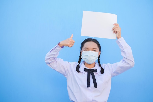 School girl show billboard on blue background