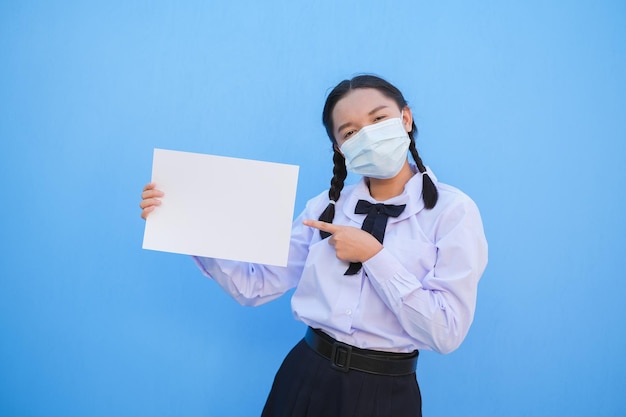 School girl show billboard on blue background