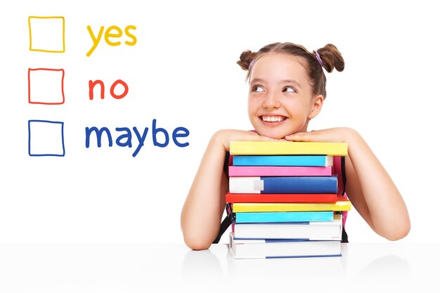 A school girl trying to make a decision over white background