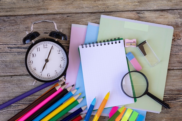 School items on wooden boards