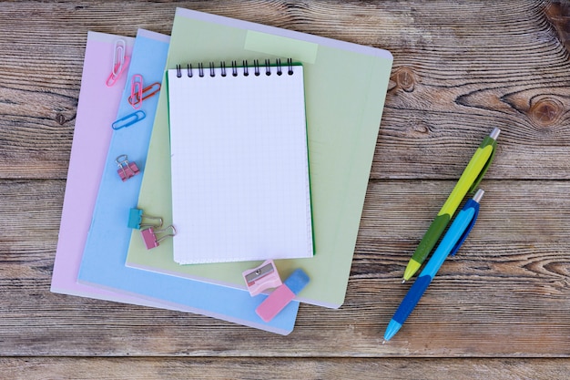 School items on wooden boards