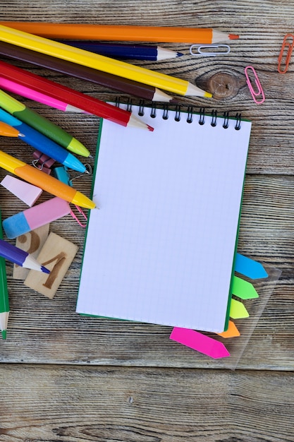 School items on wooden boards