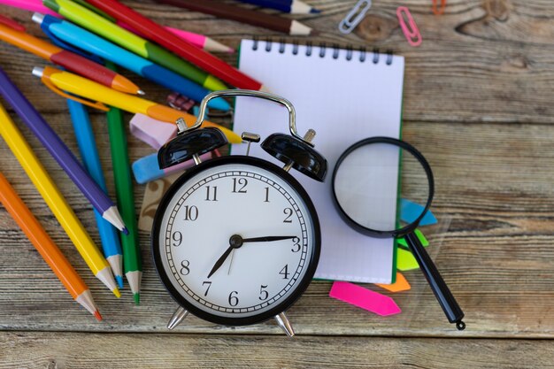 School items on wooden boards