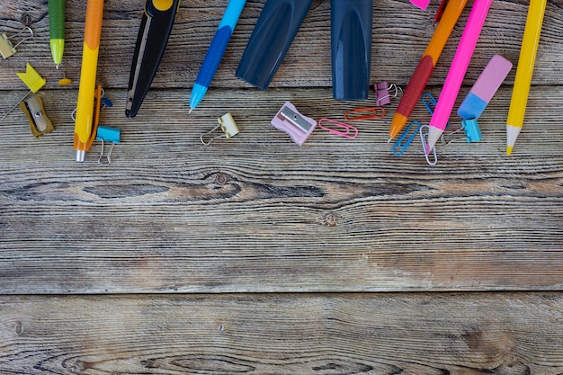 School items on wooden boards