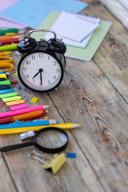 School items on wooden boards