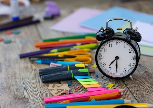 School items on wooden boards