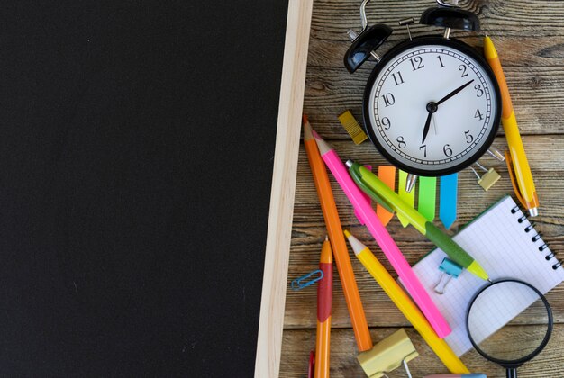 School items on wooden boards