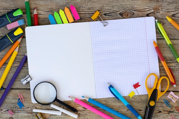 School items on wooden boards