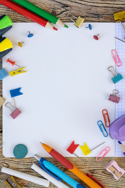 School items on wooden boards