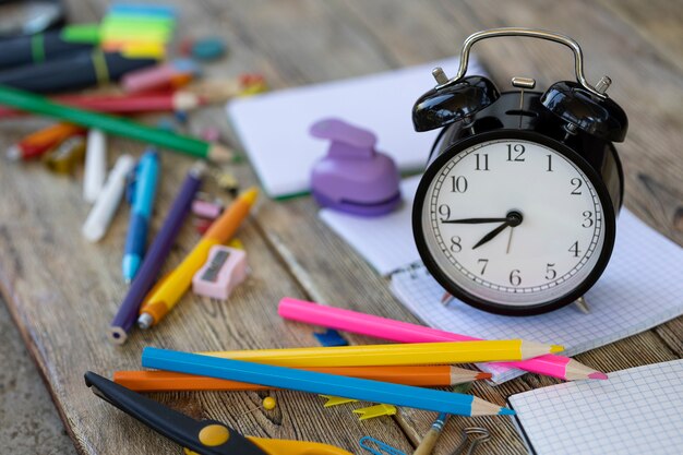 school items on wooden boards