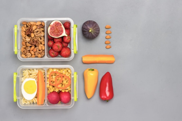 School lunch boxes with tasty food