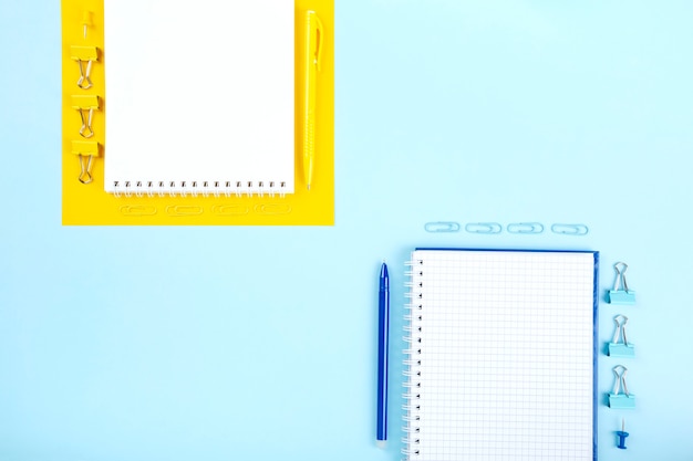 School office supplies on blue and yellow background