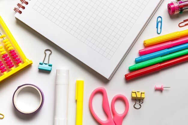 School office supplies on a desk with copy space