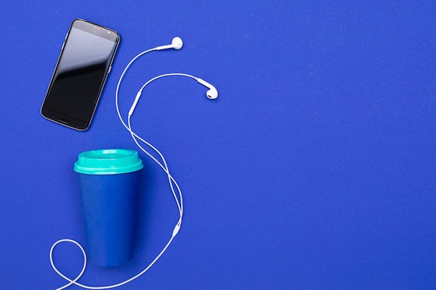 School and office supplies lie neatly on a blue wall