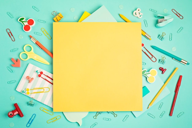 School and office supplies on pastel background