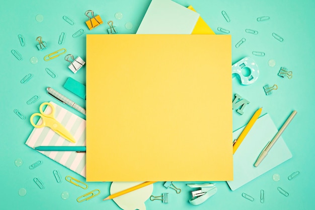 School and office supplies on pastel background