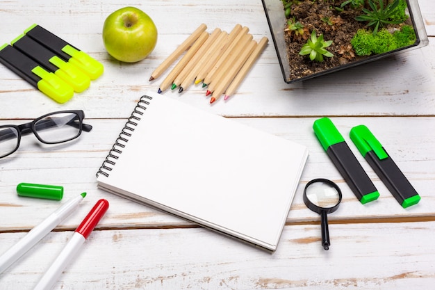 School and office supplies on white surface