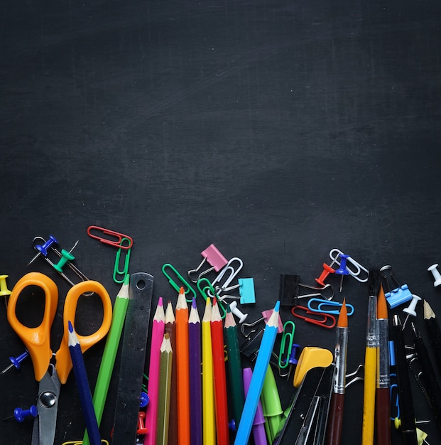 School Stationary on Blackboard Copy Space Top View