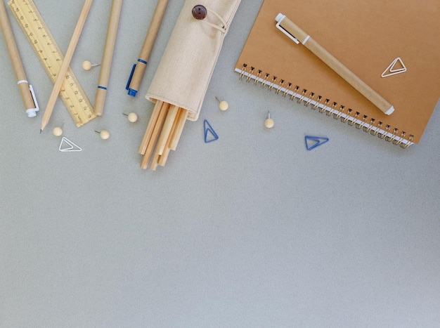 school stationery is laid out on a gray background