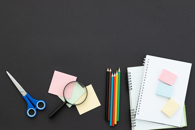 School supplies on a black background Back to school