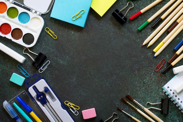 School supplies on a black table