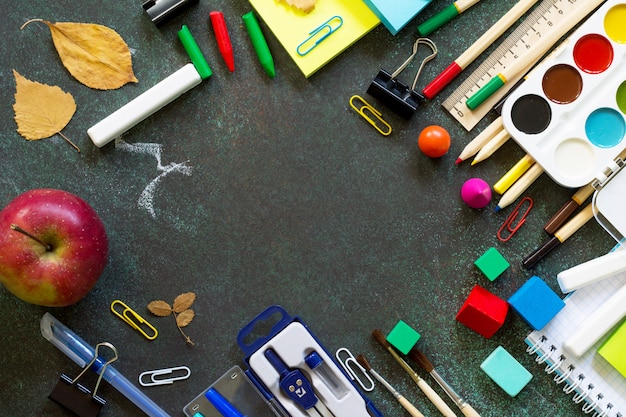 School supplies on a black table