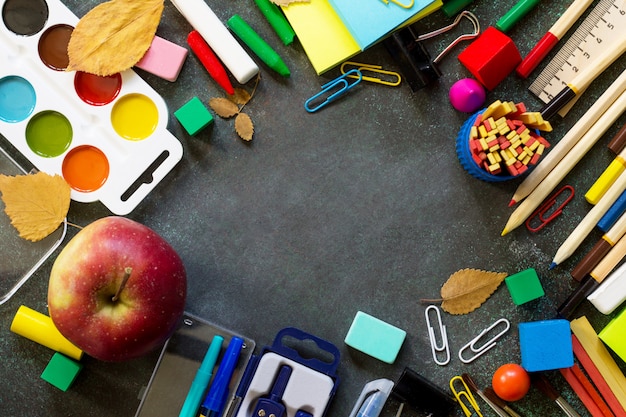 School supplies on a black table