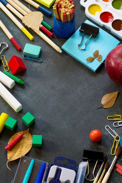 School supplies on a black table